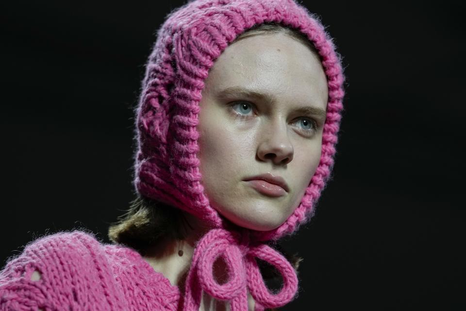 A model wears a creation as part of the Benetton women's Fall-Winter 2023-24 collection presented in Milan, Italy, Saturday, Feb. 25, 2023. (AP Photo/Luca Bruno)