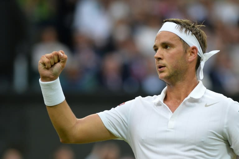 Britain's Marcus Willis reacts after a point against Switzerland's Roger Federer in their men's singles second round match at Wimbledon, on June 29, 2016