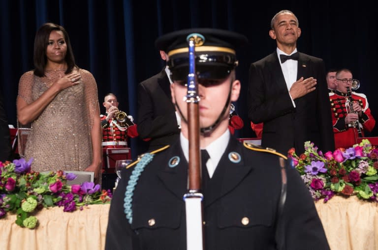 US President Barack Obama and First Lady Michelle Obama attend the 102nd White House Correspondents' Association Dinner in Washington, DC, on April 30, 2016