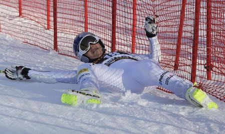 Lindsey Vonn of the U.S. lands into the security net after crashing during the women's giant slalom of the Alpine Skiing World Cup in Maribor February 21, 2015. REUTERS/Srdjan Zivulovic