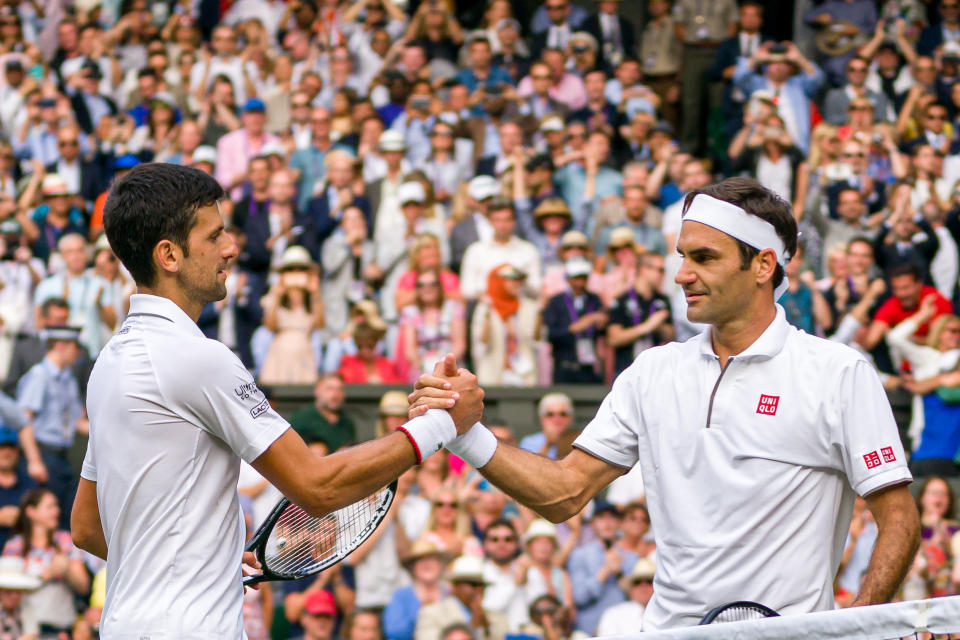 Roger Federer（圖右）、Novak Djokovic。(Photo by Andy Cheung/Getty Images)