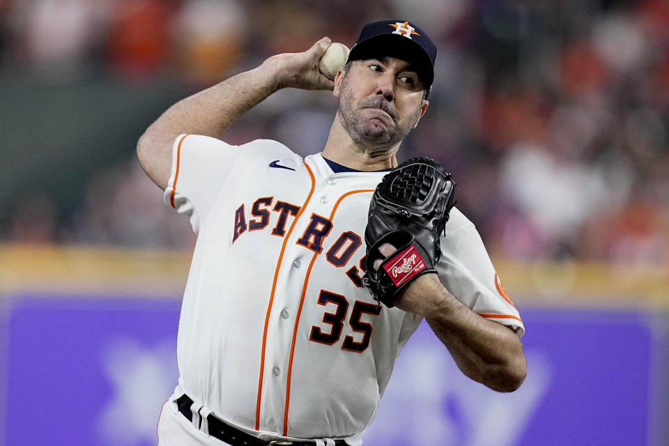 Houston Astros starting pitcher Justin Verlander (35) works during the fifth inning in Game 1 of baseball's American League Championship Series between the Houston Astros and the New York Yankees, Wednesday, Oct. 19, 2022, in Houston. . (AP Photo/Kevin M. Cox)