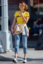 <p>In a yellow shirt, glasses, cropped jeans and Hogan sneakers out in NYC. </p>