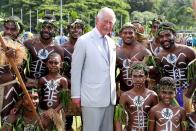 <p>Prince Charles poses for a group photo with dancers following his public ocean event at Lawson Tama Stadium in Honiara, Guadalcanal Island, Solomon Islands.</p>