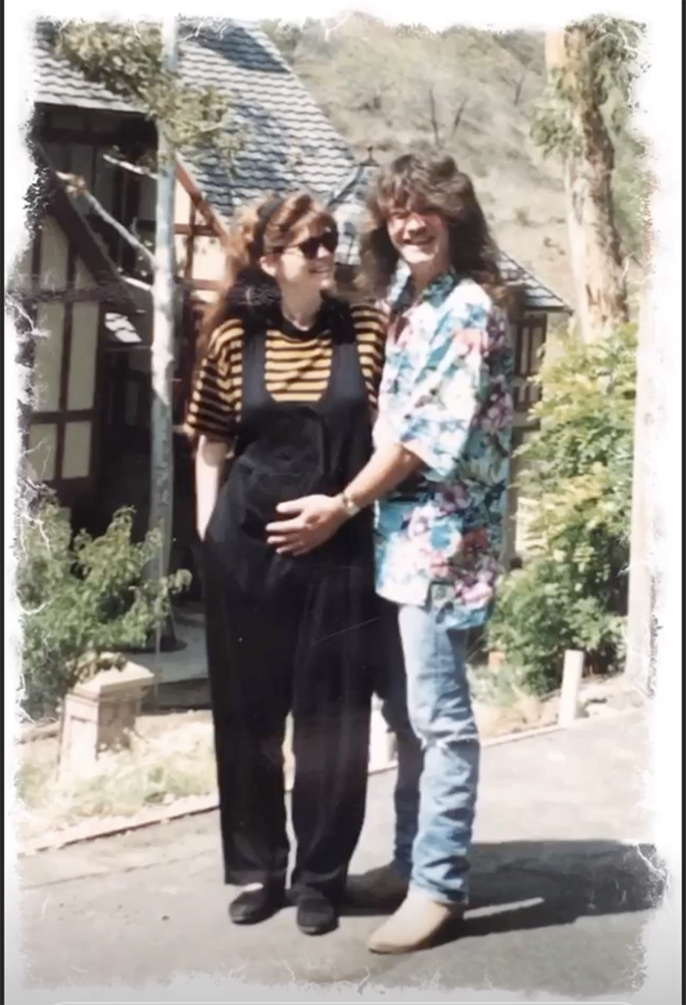 Van Halen places his hand on Bertinelli's baby bump in the early 1990s. (Valerie Bertinelli / Instagram)