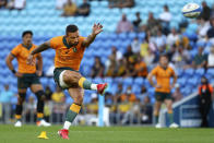 Australia's Quade Cooper attempts a penalty kick against Argentina during their Rugby Championship test match on the Gold Coast, Australia, Saturday, Oct. 2, 2021. (AP Photo/Tertius Pickard)