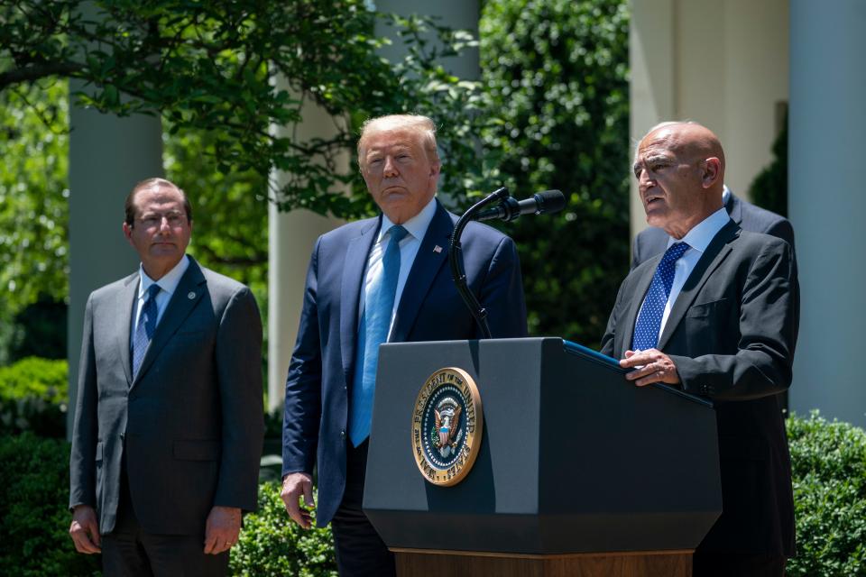 Health and Human Secretary Alex Azar, left, and President Donald Trump recruited Moncef Slaoui, former head of GlaxoSmithKline's vaccines division, for Operation Warp Speed's coronavirus vaccine development effort.