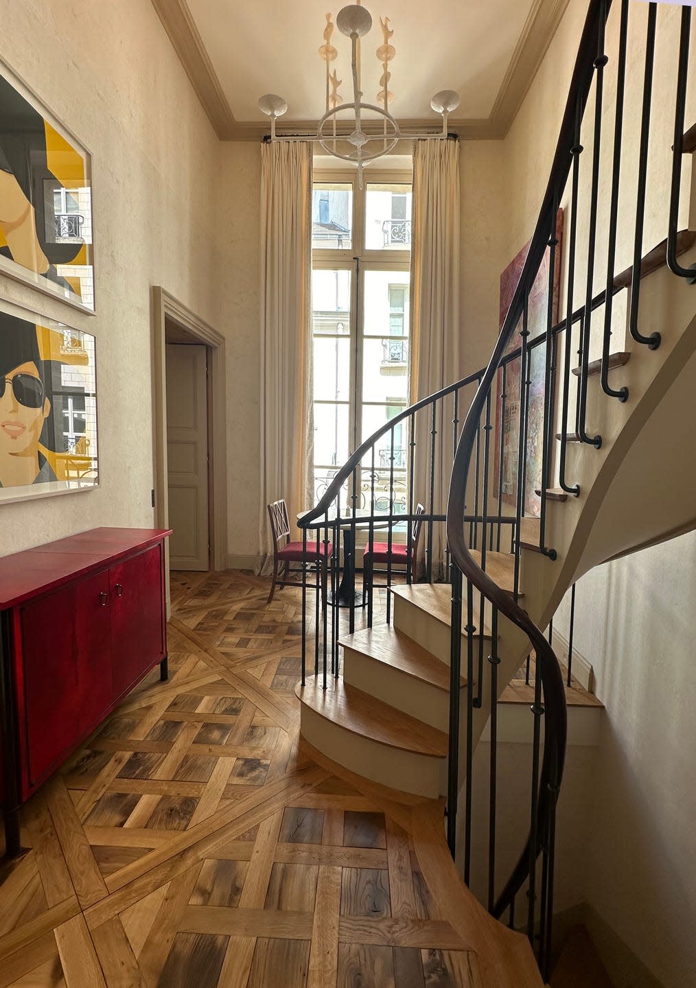 a spiral staircase in a paris apartment