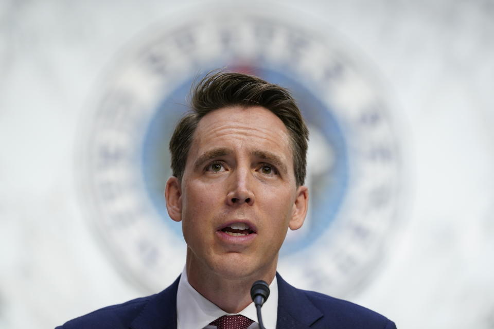 FILE - In this Oct. 12, 2020, file photo Sen. Josh Hawley, R-Mo., speaks during a confirmation hearing for Supreme Court nominee Amy Coney Barrett before the Senate Judiciary Committee on Capitol Hill in Washington. Hawley, says he will raise objections next week when the Congress meets to affirm President-elect Joe Biden’s victory in the election, forcing House and Senate votes that are likely to delay — but in no way alter — the final certification of Biden's win.(AP Photo/Susan Walsh, Pool, File)