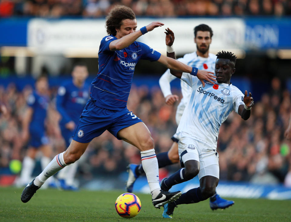 Chelsea’s David Luiz (left) and Everton’s Idrissa Gueye vie for possession