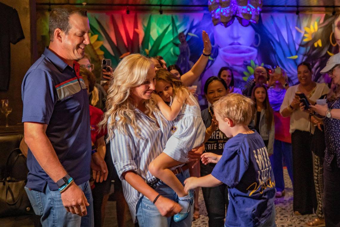 Lauren Book enters her victory party with her family at Agave Bandido restaurant in Pembroke Pines, Florida on election night, Tuesday, August 23, 2022.