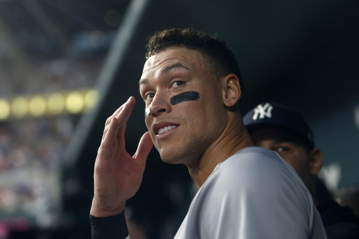 New York Yankees star Aaron Judge smiles in the dugout after hitting home run no. 62 to break the AL home run record in Arlington, Texas, Oct 4, 2022. (Photo: Tim Heitman-USA TODAY Sports)