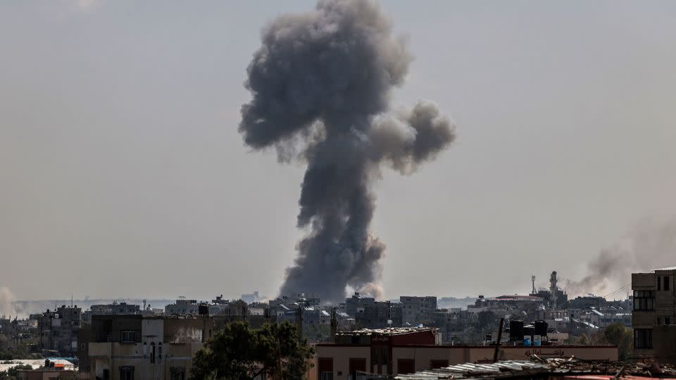Smoke billows following a strike in Nuseirat refugee camp, in central Gaza. Several journalists, including a CNN stringer, were injured in the attack on April 12. - AFP/Getty Images