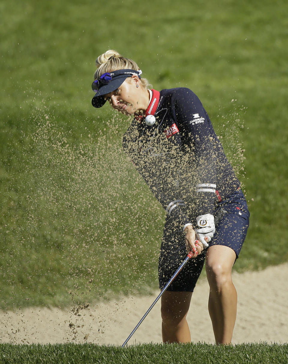 Charley Hull, of England, follows her shot out of a bunker up to the 18th green of the Lake Merced Golf Club during the first round of the LPGA Mediheal Championship golf tournament Thursday, May 2, 2019, in Daly City, Calif. (AP Photo/Eric Risberg)