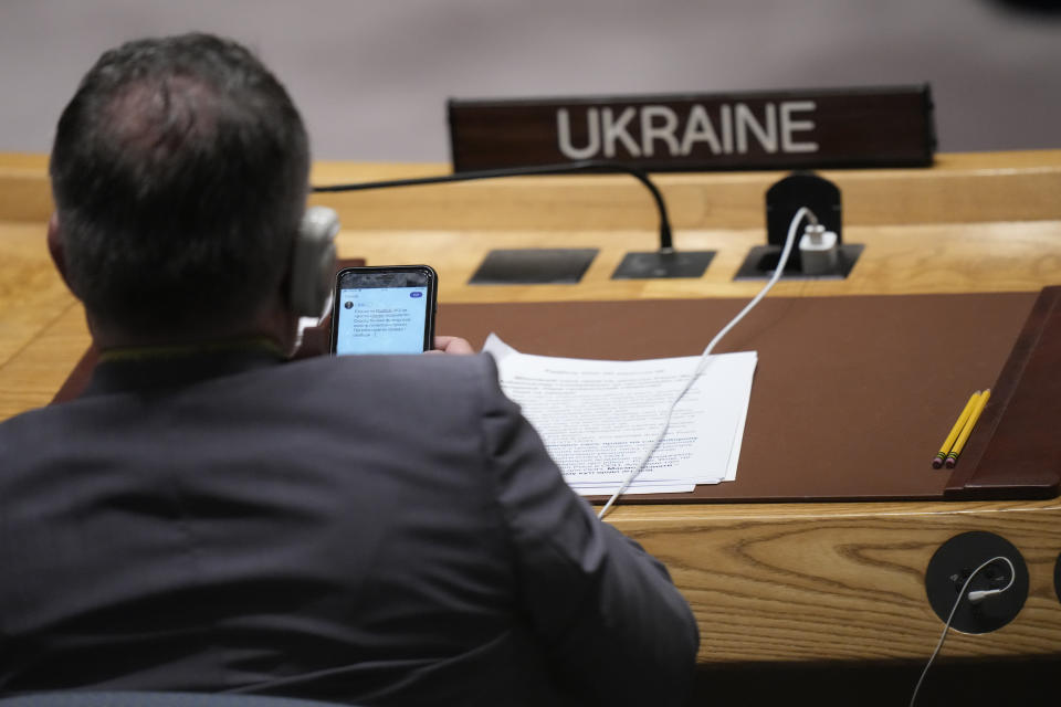 Ukrainian Ambassador to the United Nations Sergiy Kyslytsya uses his smart phone as Russian Foreign Minister Sergey Lavrov speaks during a high level Security Council meeting on the situation in Ukraine, Wednesday, Sept. 20, 2023, at the United Nations headquarters. (AP Photo/Mary Altaffer)