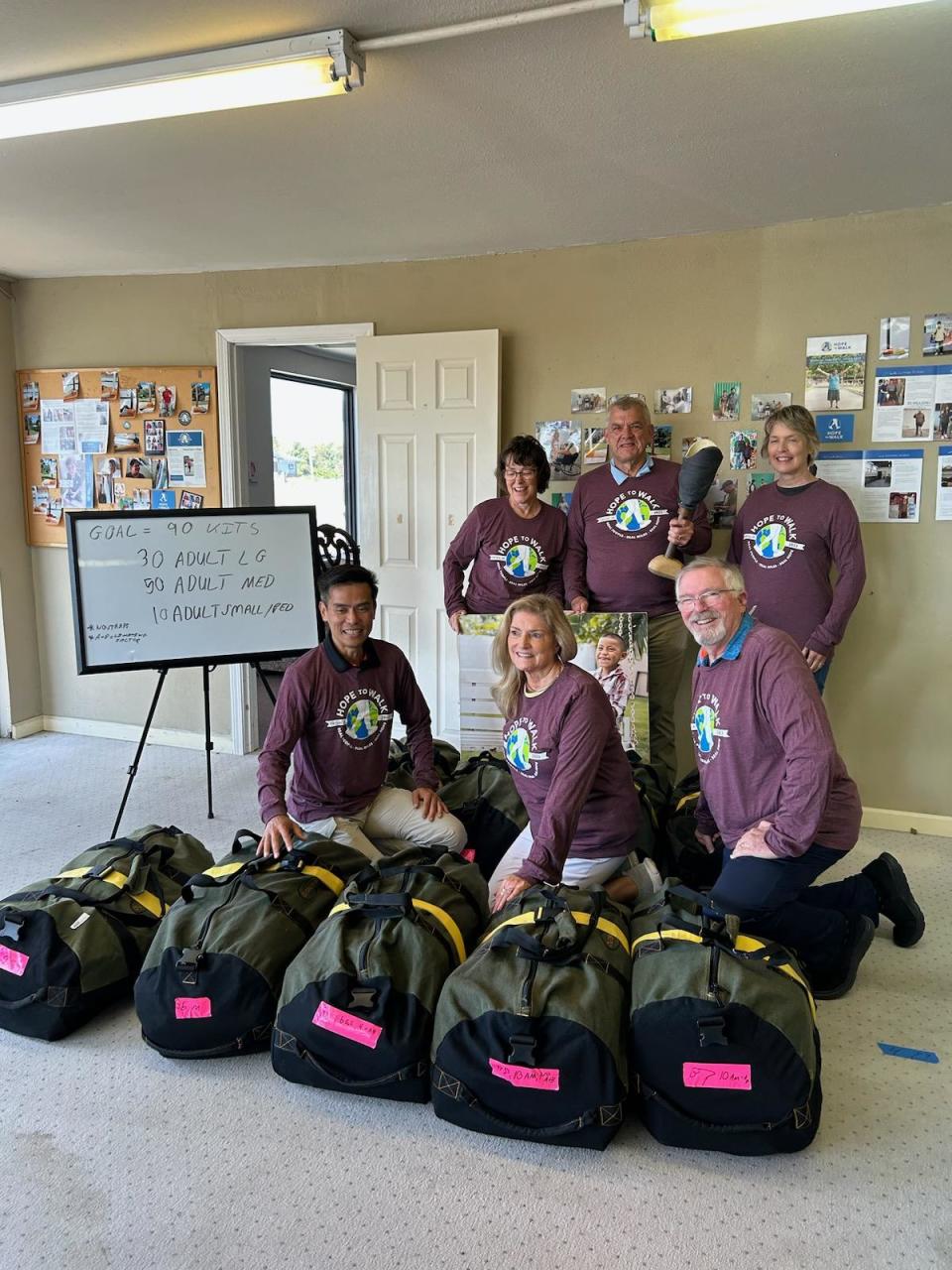 Members of Waynesboro’s Otterbein Church assembled and packed prosthetic leg kits for their Hope to Walk missions trip to Vietnam. From left, front: Dr. Stephen Bui, Jenny Baginski and Joe Baginski. Back: Julie Small and Pastor Dirk Small. Church member Melinda Potter, back right, helped with the kits, but is not going to Vietnam.