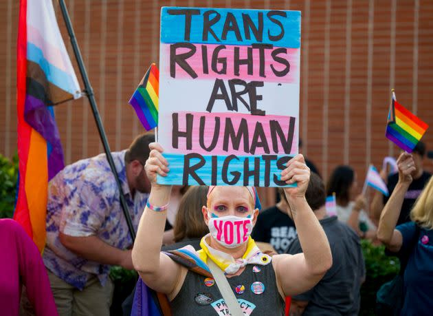 Micki Simon, a teacher in Santa Ana, California, and a parent of a transgender child, protests last fall against a proposed transgender notification policy outside an Orange Unified School District meeting.