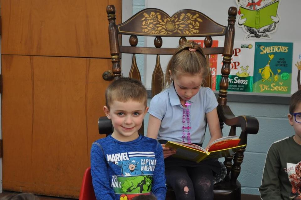 Hudson Knight was very proud to have his sister Brynn read to the class.