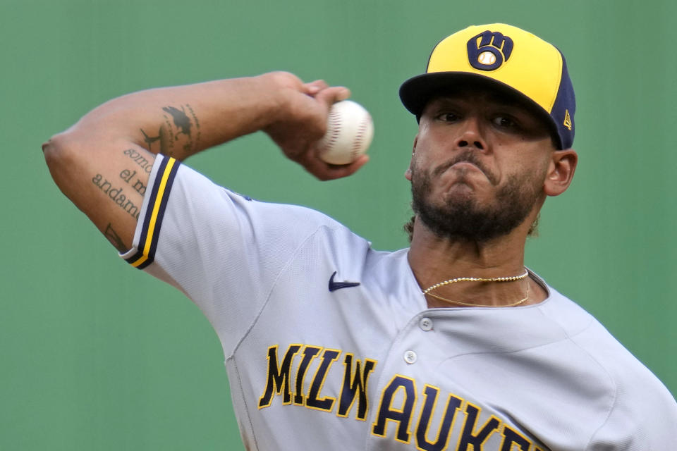 Milwaukee Brewers starting pitcher Freddy Peralta delivers during the first inning of a baseball game against the Pittsburgh Pirates in Pittsburgh, Friday, June 30, 2023. (AP Photo/Gene J. Puskar)