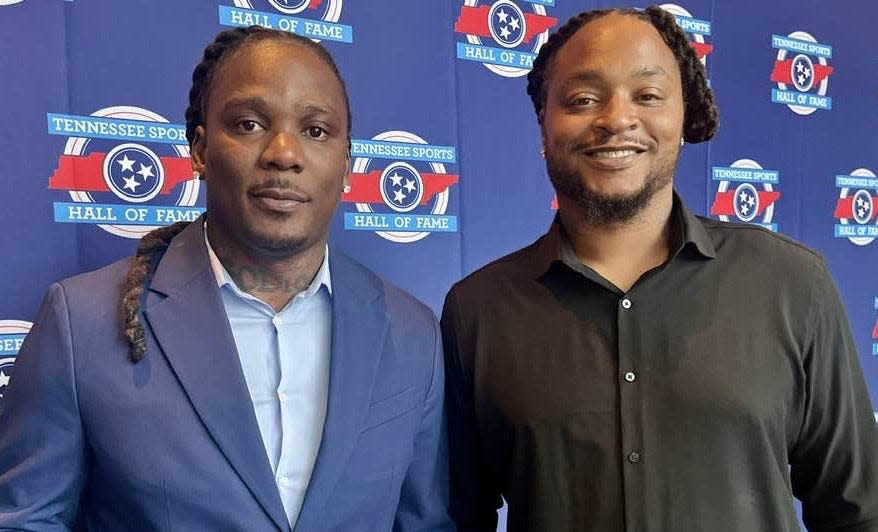 Former Tennessee Titans running back Chris Johnson (left), here with former running back and teammate LenDale White, was inducted into the Tennessee Sports Hall of Fame on Saturday evening at the Omni Nashville Hotel.