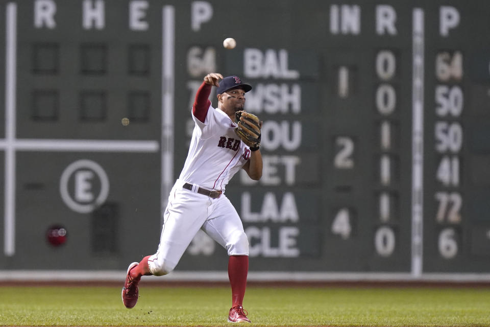Boston Red Sox's Xander Bogaerts throws to first to retire New York Yankees' Gleyber Torres during the first inning of a baseball game Tuesday, Sept. 13, 2022, in Boston. (AP Photo/Steven Senne)