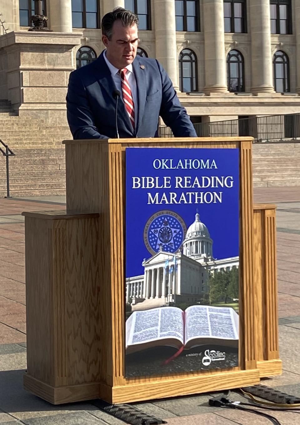 Gov. Kevin Stitt participates Wednesday in the Oklahoma Bible Reading Marathon at the Capitol in Oklahoma City.
