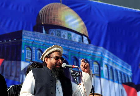 Hafiz Muhammad Saeed (C) speaks to supporters during a gathering in Rawalpindi, Pakistan December 29, 2017. REUTERS/Faisal Mahmood/Files