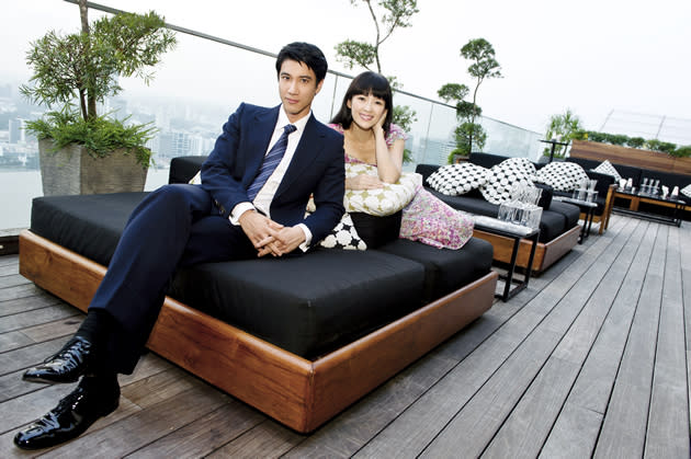 Actress Zhang Ziyi poses with co-star Wang Leehom at Sands SkyPark – Marina Bay Sands.