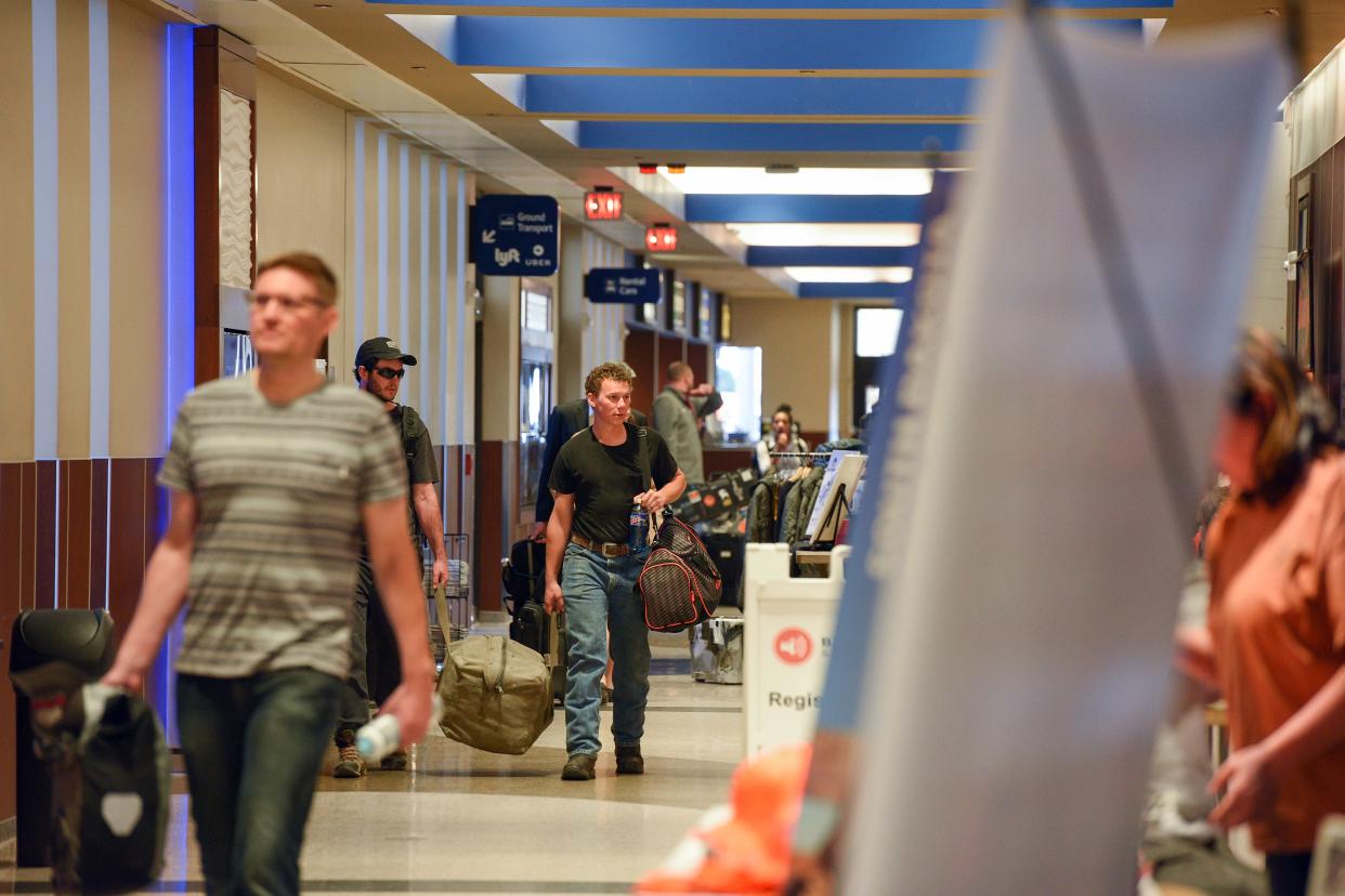 Travelers arrive at the Sioux Falls Regional Airport.