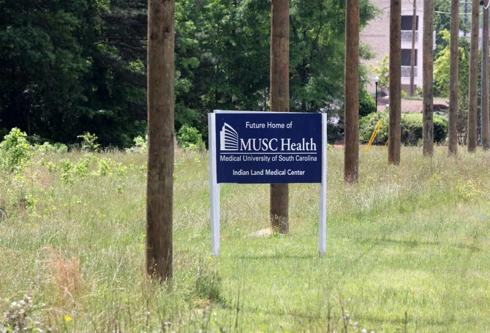 A sign visible from U.S. 521 lets drivers know the Medical University of South Carolina will build a medical center on the site.
