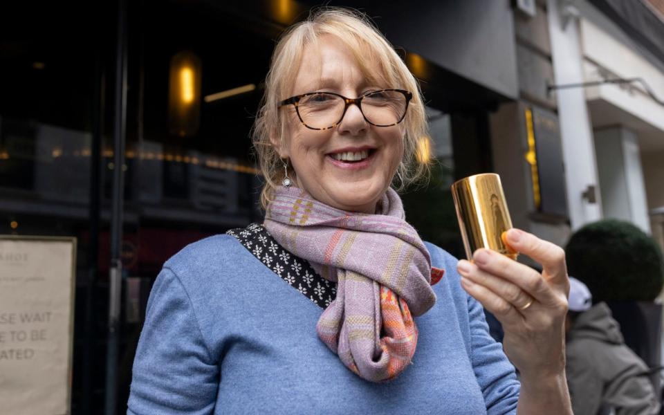 Writer Susy Atkins with the coffee outside Shot in Mayfair