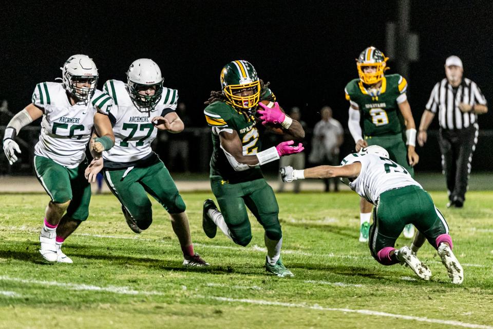 St. Mark's (2) Thane Martin runs through the defense in Archmere's upset victory at St. Mark's, Friday, Oct. 7, 2022.