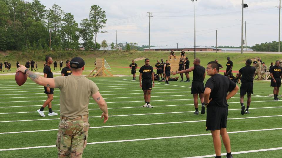 Members of the Future Soldier Prep Course play a game of football in August 2022 at Fort Jackson, S.C. (Davis Winkie/Staff)