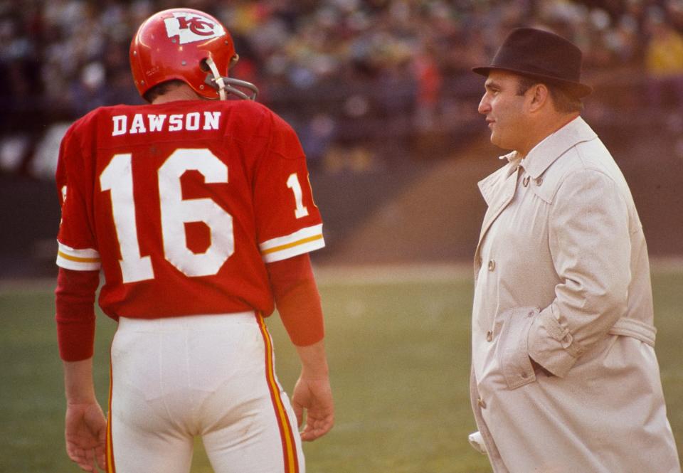 Nov 7, 1971; Flushing, NY, USA; FILE PHOTO; Kansas City Chiefs head coach Hank Stram talks to Len Dawson (16) on the sideline against the New York Jets at Shea Stadium.  Mandatory Credit: Malcolm Emmons-USA TODAY NETWORK