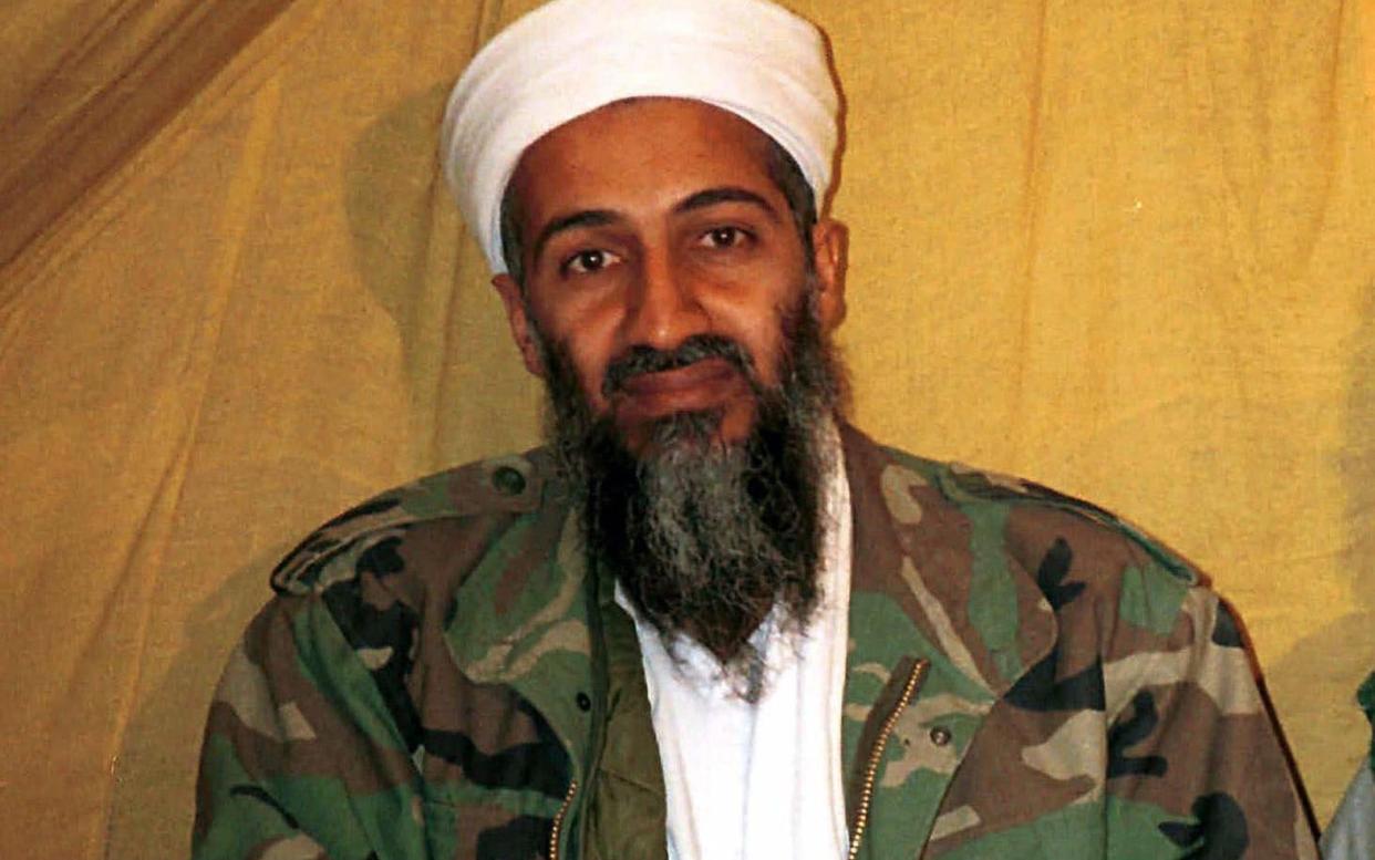 An undated file photo of the al-Qaeda leader Osama bin Laden in Afghanistan - AP