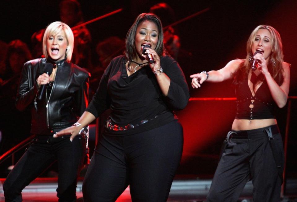 Kellie Pickler, Mandisa and Melissa McGhee perform onstage during the “American Idol” Season 5 finale. Getty Images