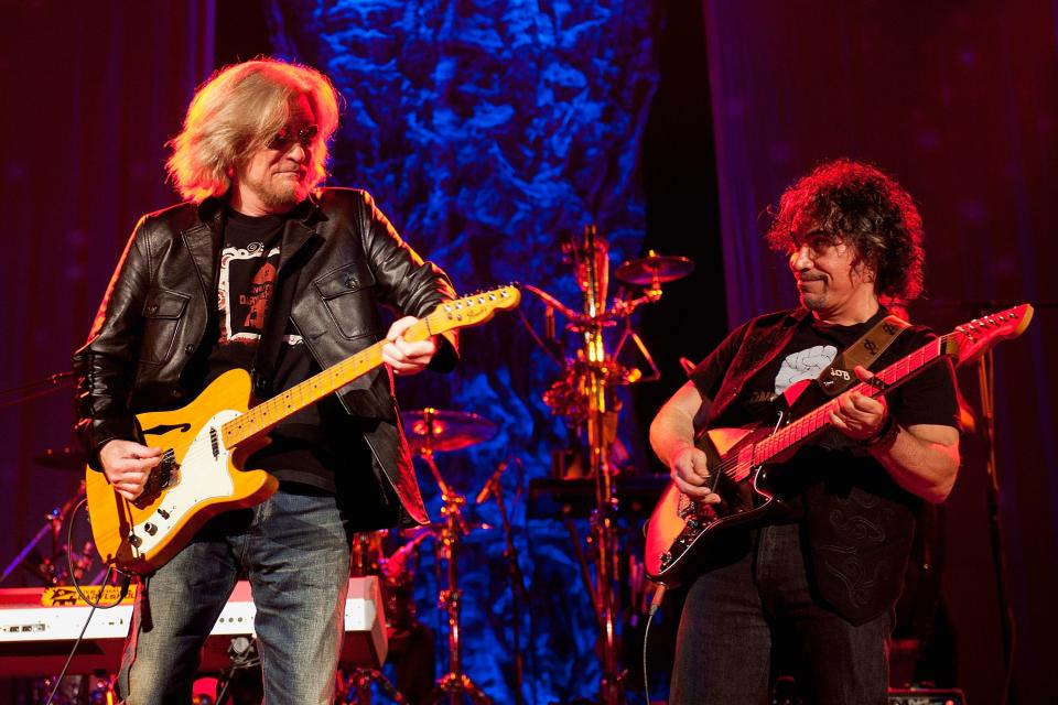 Daryl Hall and John Oates perform at the Ryman Auditorium on June 2, 2013, in Nashville.