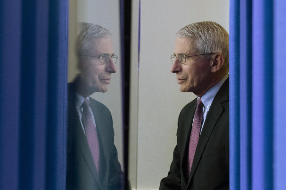 FILE - Dr. Anthony Fauci, director of the National Institute of Allergy and Infectious Diseases, arrives to speak about the coronavirus in the James Brady Press Briefing Room of the White House, April 22, 2020, in Washington. Fauci steps down from a five-decade career in public service at the end of the month, one shaped by the HIV pandemic early on and the COVID-19 pandemic at the end. (AP Photo/Alex Brandon, File)