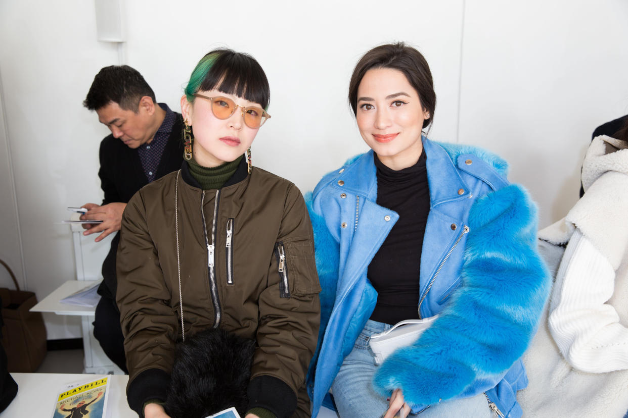 NEW YORK, NY - FEBRUARY 14:  Yuki Matsuda (L) and Nicole Andersson attend the Michael Kors Collection Fall 2018 Runway Show at the Vivian Beaumont Theatre on February 14, 2018 in New York City.