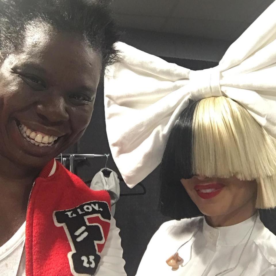 <p>Jones is gleeful. Sia is hidden under a wig … but they apparently had a good conversation. Was it about how to move through the world with half of your face in hiding? Oh, who cares? These two are super-cute — individually and together. (Photo: <a rel="nofollow noopener" href="https://www.instagram.com/p/BKNCBMej7yd/?hl=en&taken-by=lesdogggg" target="_blank" data-ylk="slk:Leslie Jones via Instagram;elm:context_link;itc:0;sec:content-canvas" class="link ">Leslie Jones via Instagram</a>) </p>