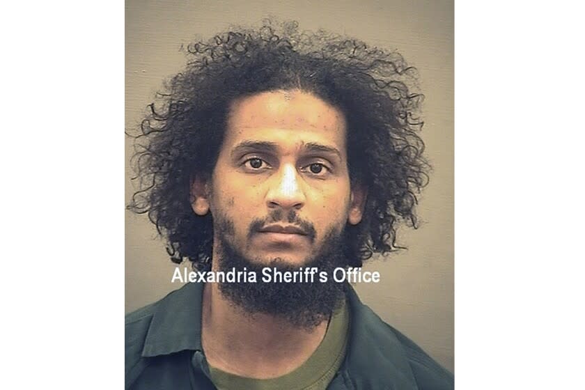 FILE - In this photo provided by the Alexandria Sheriff's Office is El Shafee Elsheikh who is in custody at the Alexandria Adult Detention Center, Wednesday, Oct. 7, 2020, in Alexandria, Va. The British national was sentenced to life in prison on Friday, Aug. 19, 2022 for his role in an Islamic State hostage-taking scheme. Roughly two dozen Westerners were taken captive a decade ago by a notorious group of masked captors nicknamed "The Beatles" for their British accents. El Shafee Elsheikh received his sentence Friday in an Alexandria, Va. courtroom. (Alexandria Sheriff's Office via AP)