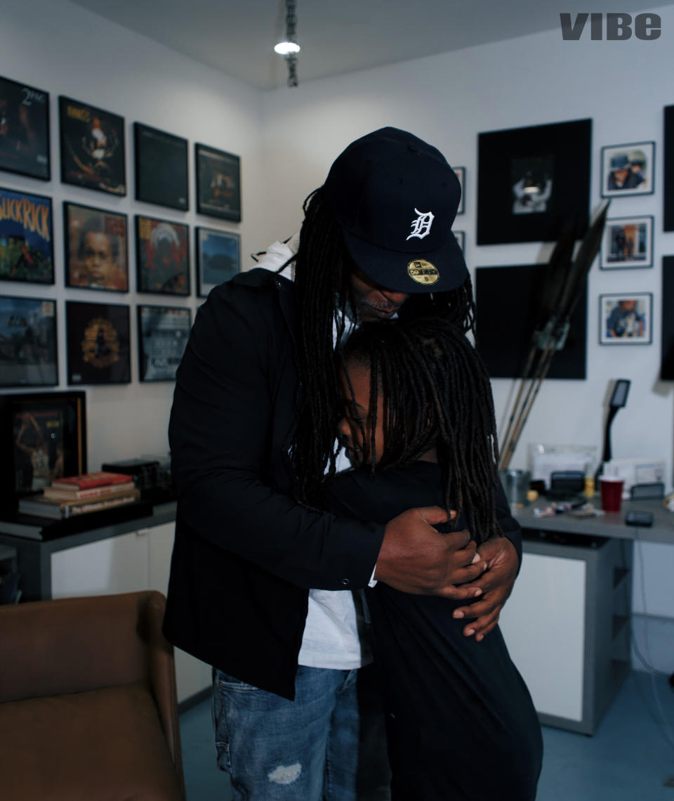 Shaka Senghor and his 10-year-old son, Sekou, embrace at home in LA. - Credit: Laetitia Rumford