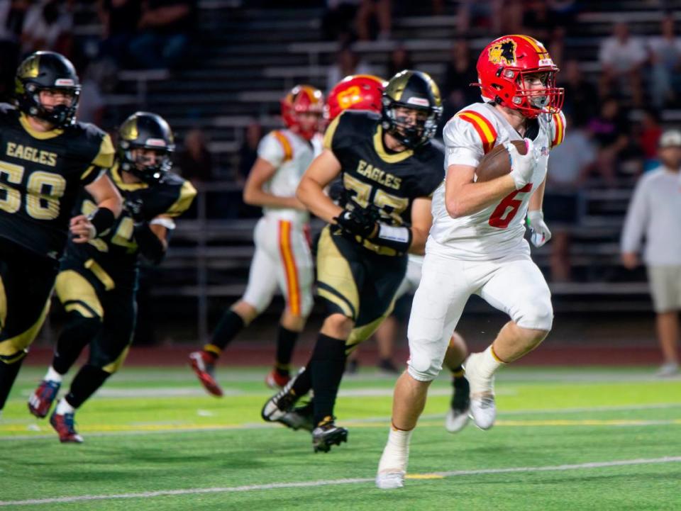 Chase Lopez, 6 of Oakdale High runs the ball up field during the Oakdale vs Enochs game Friday Sept. 22, 2023