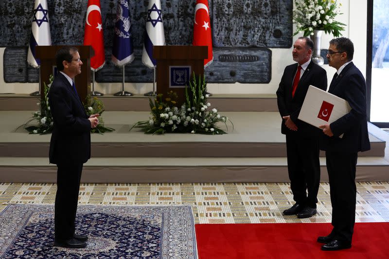 Turkey's new ambassador Torunlar presents his diplomatic credentials to Israel's President Herzog at the president's residence, in Jerusalem