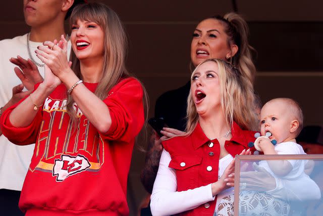 <p>Jamie Squire/Getty</p> Taylor Swift and Brittany Mahomes react during a game between the Los Angeles Chargers and Kansas City Chiefs at GEHA Field at Arrowhead Stadium on Oct. 22, 2023 in Kansas City