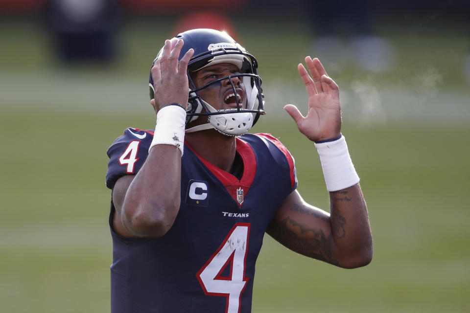 Houston Texans quarterback Deshaun Watson (4) reacts during the second half of an NFL football game against the Chicago Bears in Chicago, in this Sunday, Dec. 13, 2020, photo. Star quarterback Deshaun Watson has requested a trade from the Houston Texans, a person familiar with the move told The Associated Press. The person spoke to the AP on the condition of anonymity Thursday, Jan. 28, 2021, because they weren’t authorized to discuss the request publicly. (AP Photo/Kamil Krzaczynski)