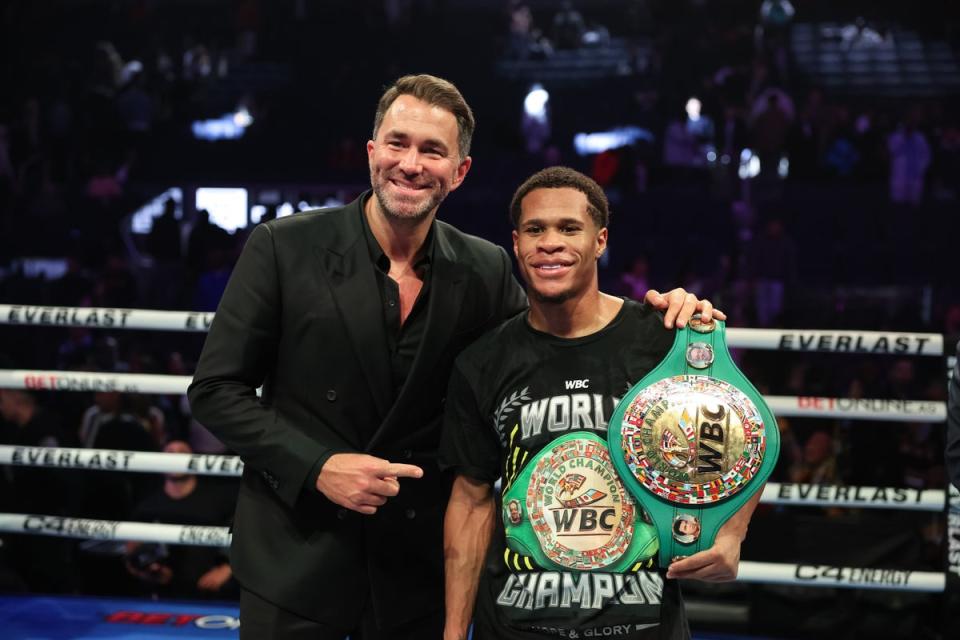 Haney celebrates with promoter Eddie Hearn after beating Prograis (Getty Images)