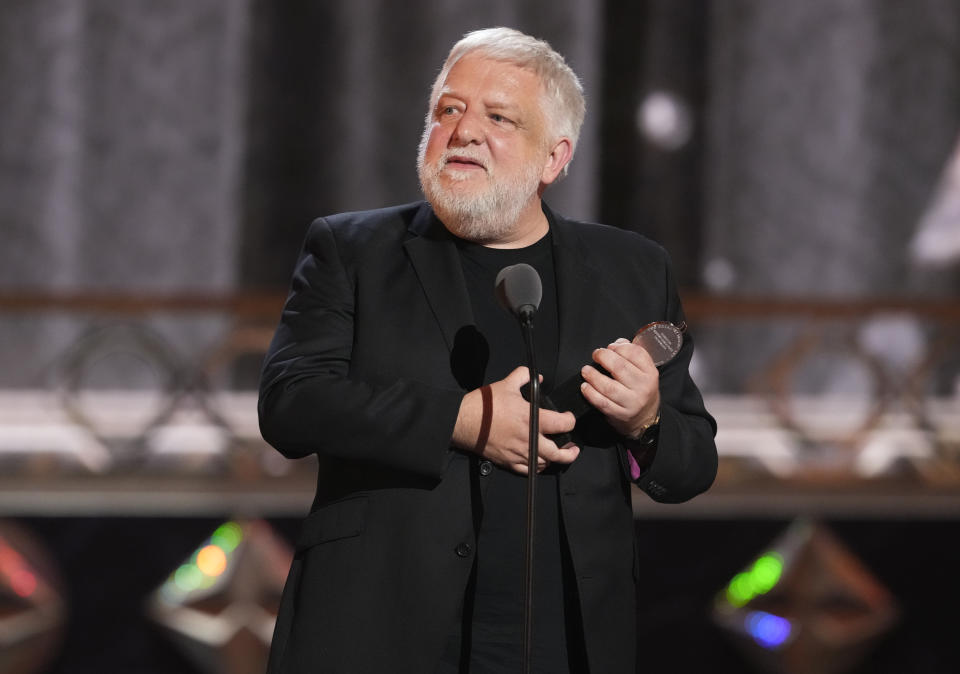 Simon Russell Beale accepts the award for best leading actor in a play for "The Lehman Trilogy" at the 75th annual Tony Awards on Sunday, June 12, 2022, at Radio City Music Hall in New York. (Photo by Charles Sykes/Invision/AP)