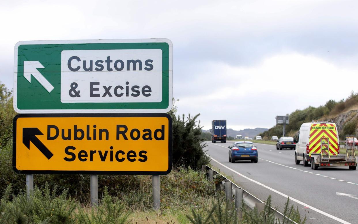 Signs point to an old customs and excise area on the Dublin road in Newry, Northern Ireland, on October 1, 2019 on the border between Newry in Northern Ireland and Dundalk in the Irish Republic. - Britain will give the EU new proposals for a Brexit deal "shortly", Prime Minister Boris Johnson said on October 1, but rejected reports it would see customs posts along the Irish border - PAUL FAITH/AFP/GETTY IMAGES