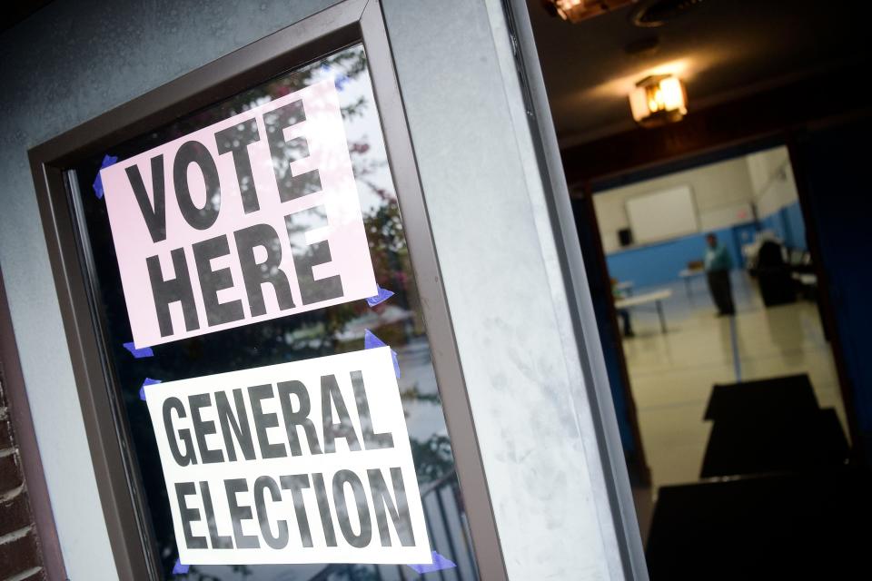 "Vote Here" signs mark the entrance to a polling location for Knoxville City Council at First Church of the Nazarene in West Knoxville on Aug. 31, 2021. A bill in the state legislature would limit Knoxville voters to voting for only their district representative, rather than all city voters being allowed to participate in each district’s citywide general election under our current system.